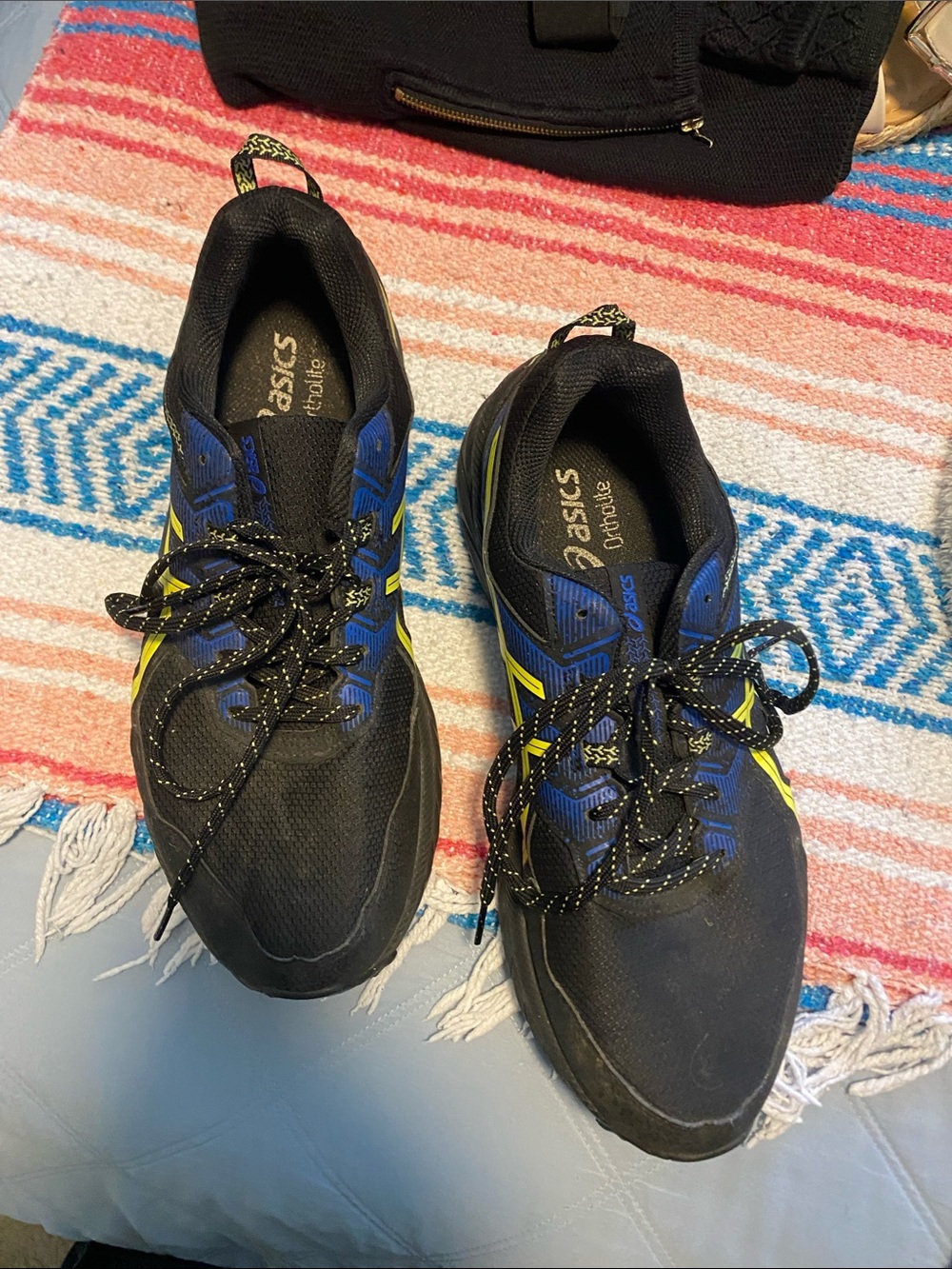 Asics Black Athletic Shoes with Blue Panels and Yellow Accents
